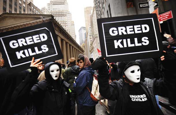 Pohlep ubija: 62 najbogatejših zemljanov ima toliko premoženja kot polovica človeštva (na fotografiji demonstracije pred sedežem borze na Wall Streetu v New Yorku) / Foto: Profimedia