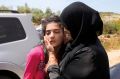 12-letna zapornica Dima Al Vavi v objemu svoje mame