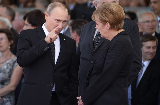 Putin in Merklova v Normandiji