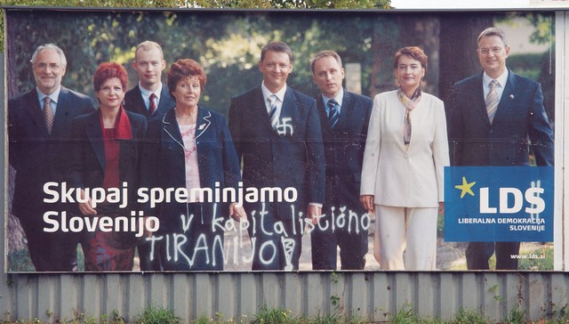 Ministrska ekipa LDS okrepljena s poslankama na predelanem plakatu LDS v Ljubljani