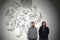 Kurator David Schilter in avtor Oskars Pavlovskis: Poslednja vžigalica, razstava latvijske stripovske revije Kuš, Kino Šiška, Ljubljana