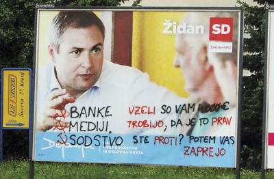  SD: ta stranka ima torej v rokah banke, medije in sodstvo, poleg tega so nam vzeli še 4000 EUR. Hm, samo toliko? (Križišče Oldhamske in Partizanske)