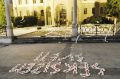 »Seksizem sveti v akademskem okolju – ugasnimo ga!« – akcija Vstajniških socialnih delavk pred stavbo ljubljanske univerze