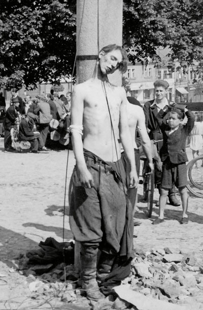 Maščevanje: trupla nemških mož visijo z uličnih svetilk in dreves v Roudnicah nad Labo, češkem mestecu, le nekaj kilometrov oddaljenem od koncentracijskega taborišča Theresienstadt
