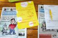 Pozor, otroke je treba zavarovati pred krivoverskimi nauki (fotografije naslovnice Domovine na stojnici, kjer zbirajo podpise za razpis referenduma) 