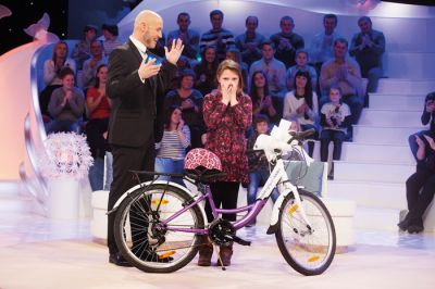 Peter Poles in desetletna deklica, ki je Božičku pisala, da si želi kolo.