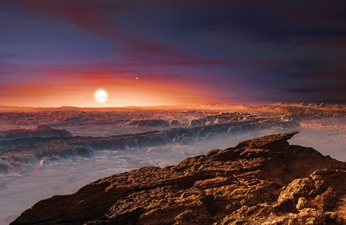 Lani odkriti planet Proksima b kroži okoli nam najbližje zvezde Proksima Kentavra in je tako nam najbližji eksoplanet, oddaljen le štiri svetlobna leta. Verjetno je kamnit, na njem bi lahko obstajala voda, a za življenje je verjetno prehladen. Na sliki površje planeta, kakršno si je zamislil grafi k Martin Kornmesser iz Evropske vesoljske agencije.