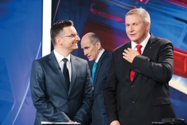 Marjan Šarec (levo), Dejan Židaj (desno) in Janez Janša (zadaj)