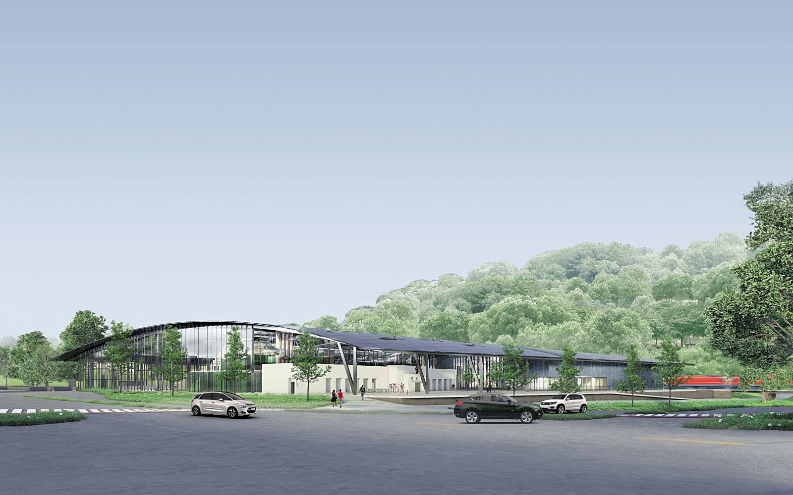 Pogled kaže Lorenzov arhitekturni projekt iz križišča Celovške in Bleiweisove ceste. Lok enotne strehe prekrije celotni program, ohranili bodo historično pročelje kopališča in nanj umestili kopijo Goršetove Kopalke; Lattermanova avenija kot podaljšek drevoreda bo vodila v Park Tivoli.