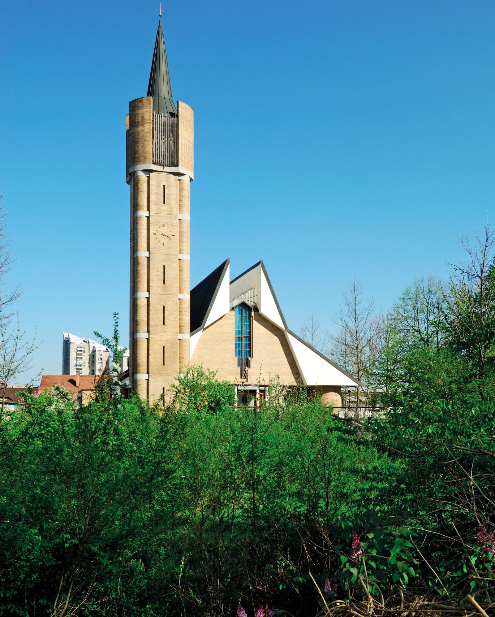 V letih 1990–94 je Mihelič načrtoval cerkev v Stožicah v Ljubljani. Sakralni prostor je položil v dvignjeno in zaobljeno dvorano, ob razgledni terasi pred vhodom pa je postavil vitek zvonik.