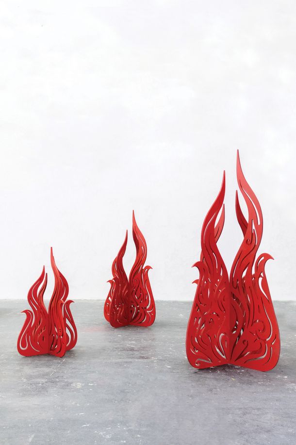 Naslov instalacije Dress me in Fire izhaja iz naslova pesmi V ogenj zdaj obleci me slovenske pevke Nuše Derenda. 