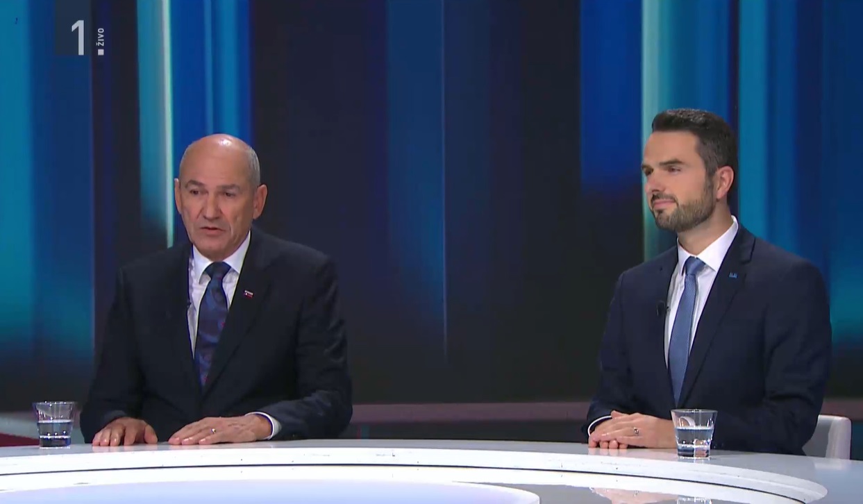 Janez Janša in Matej Tonin med pogovorom na TV Slovenija