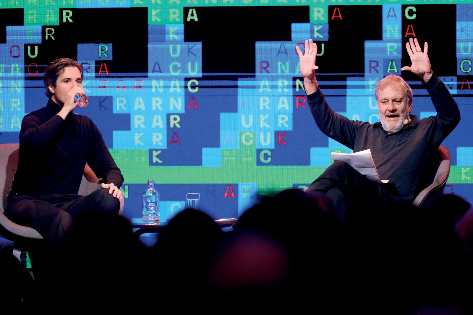 Luka Mesec in Slavoj Žižek med razpravo