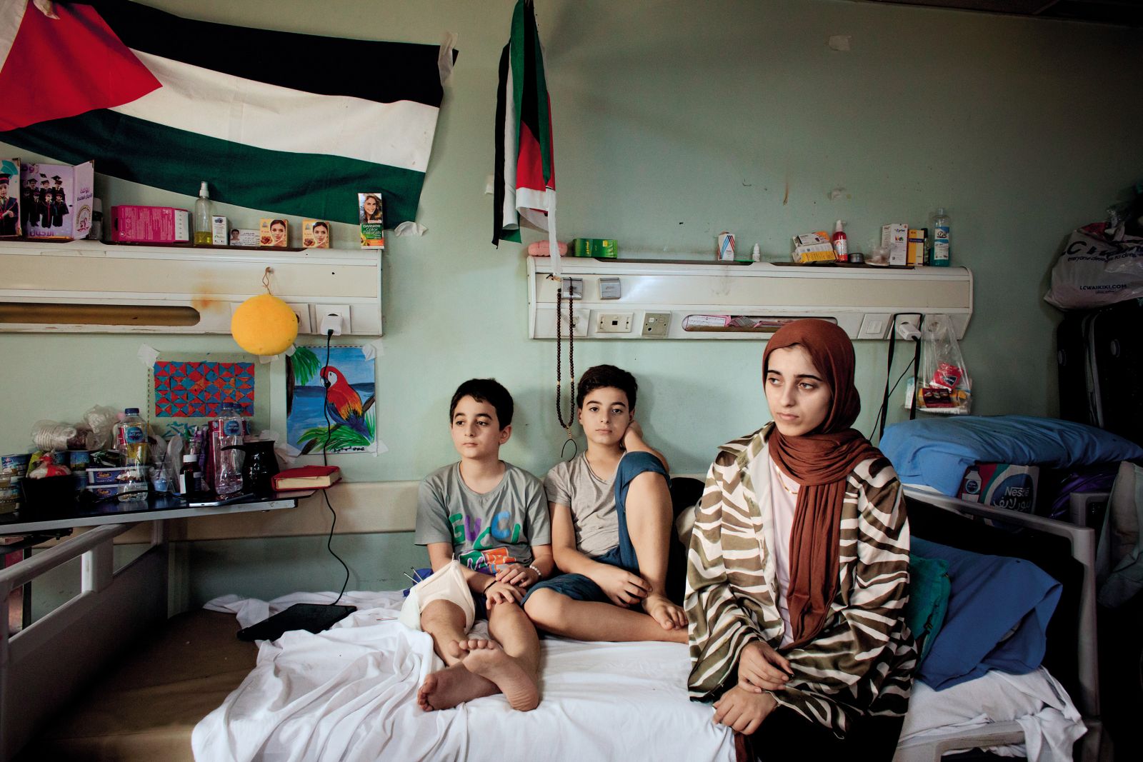 Dvojčka Abdal in Mohamed (10 let) in njuna sestra Farah (14) so bili med zadnjimi Palestinci, evakuiranimi iz Gaze, preden je izraelska vojska v začetku maja zavzela mejni prehod Rafa med Gazo in Egiptom. Kairo, 14. oktober.