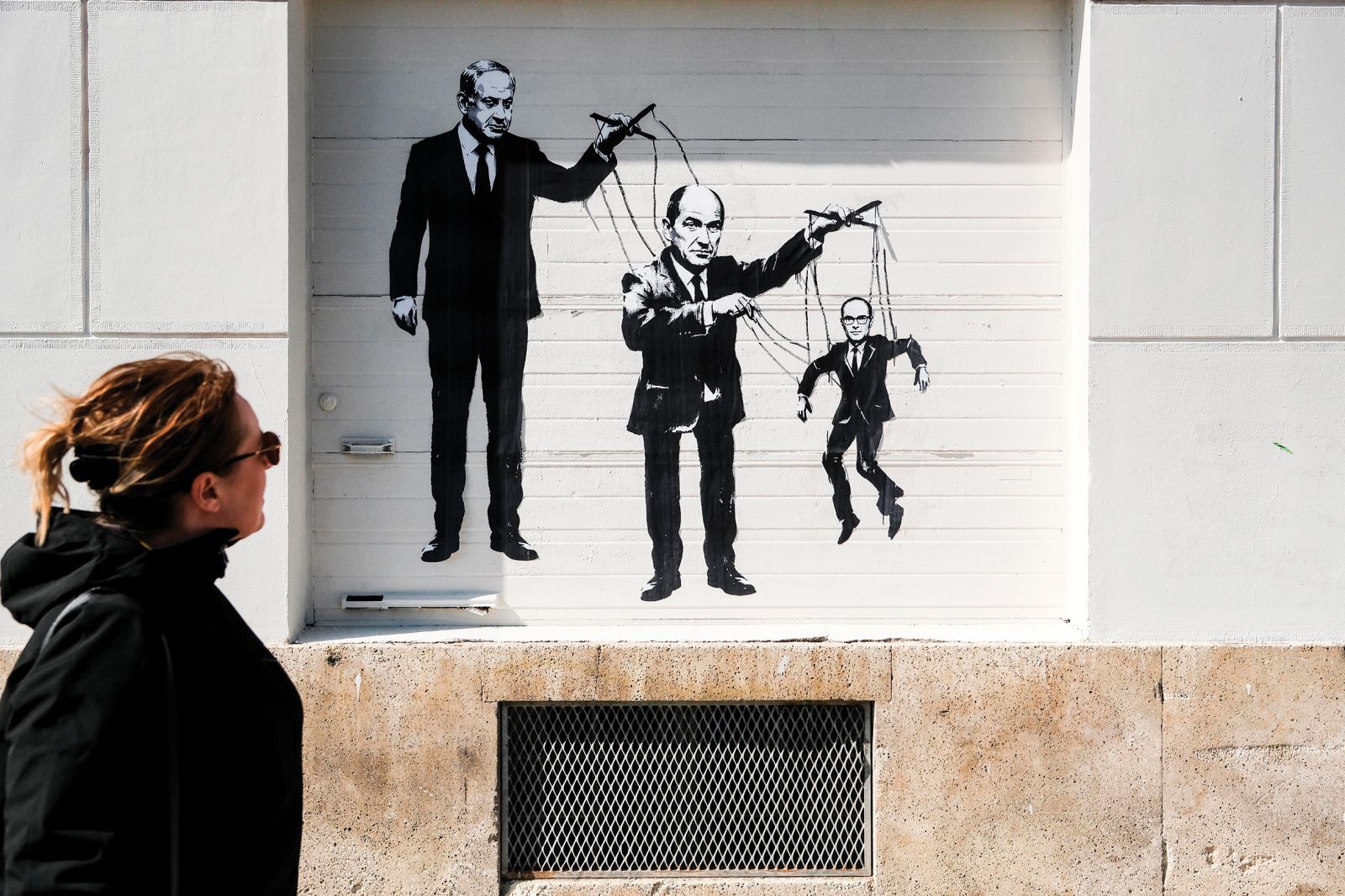 Prijateljski trojček na grafitu v Ljubljani | Janez Zalaznik