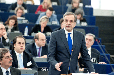 Grški premier Antonis Samaras pravi, da je Grčija dokaz, da so se kasandre s črnimi prerokbami o izstopu Grčije iz območja evra in propadu skupne valute motile